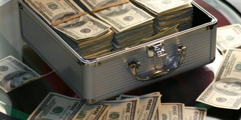 A cash box and money