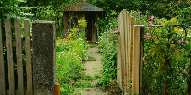 A gate leading to a garden.