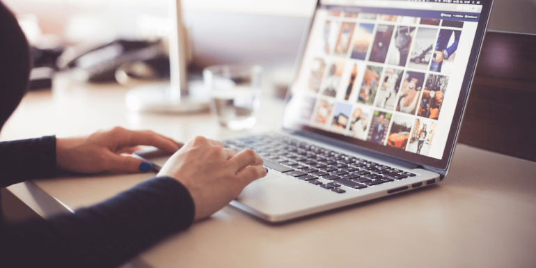 A woman on a laptop.