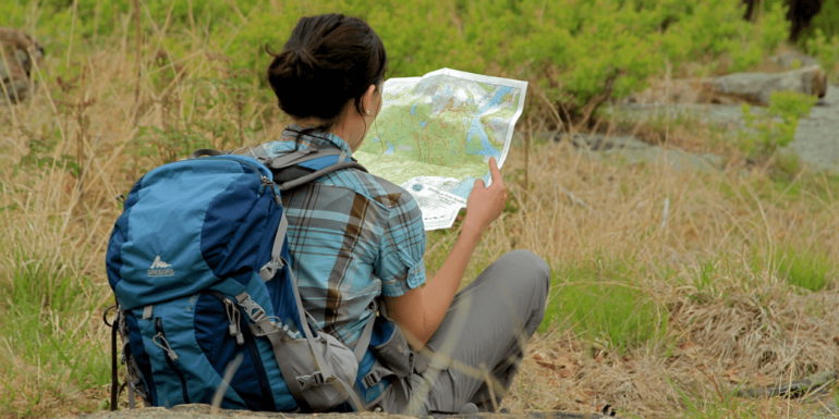 A woman with a map.