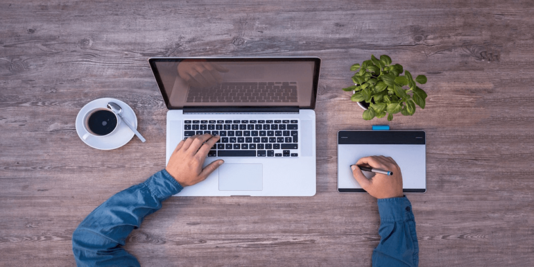 A person working on a laptop.