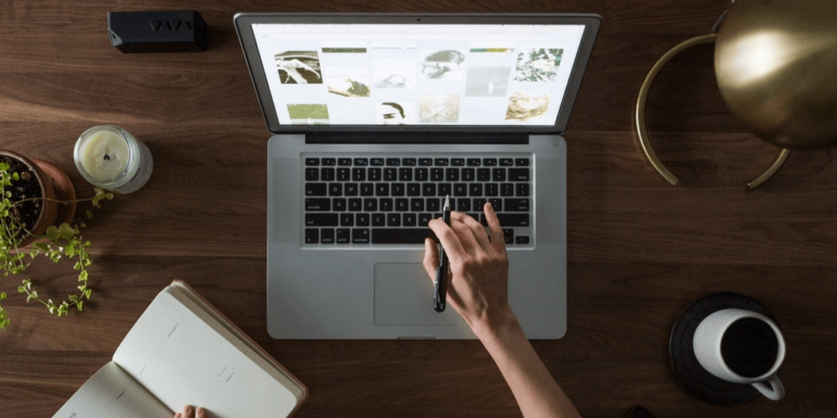 A person working on a laptop.